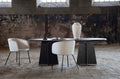 Black Bootcut Oval Dining Table - The Outlet Home