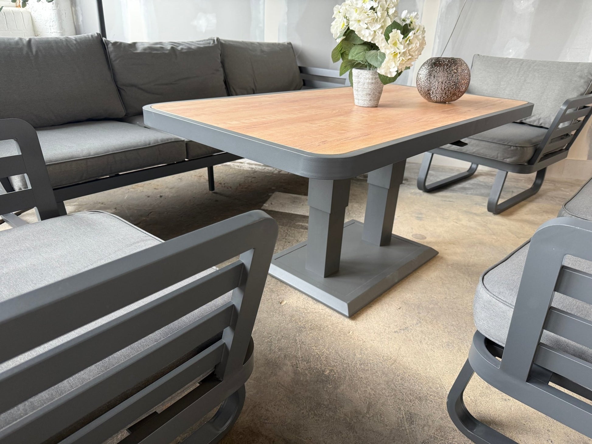 Ex Display Helsinki Luxury Aluminium Sofa Set with Rise and Fall Ceramic Dining Table - The Outlet Home